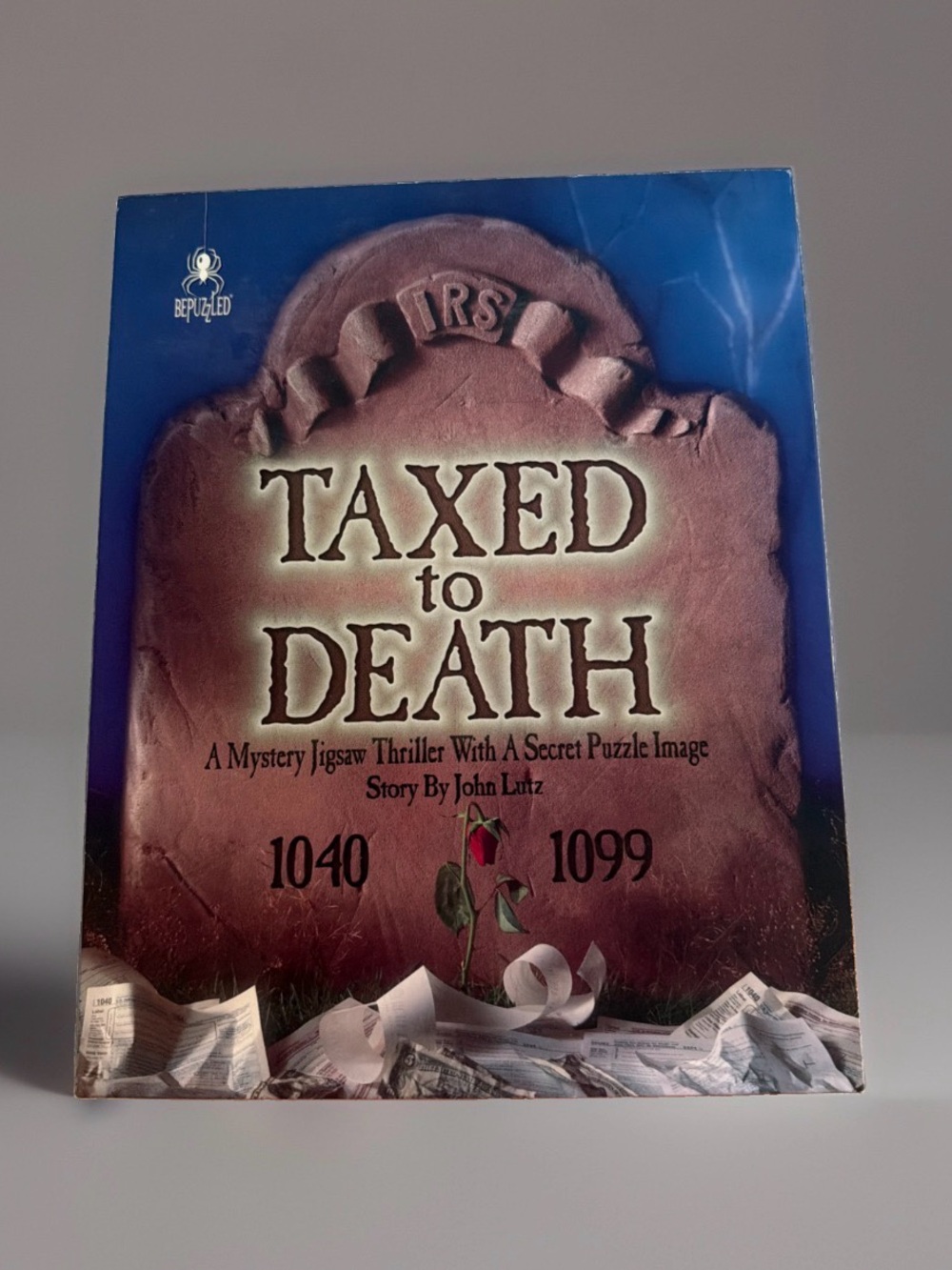 BePuzzled "Taxed to Death" 1000-pc mystery jigsaw puzzle thriller. Great Cond.